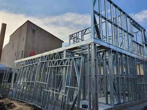 Installation of Metal Frame for a House Equipped in Gold thumbnail