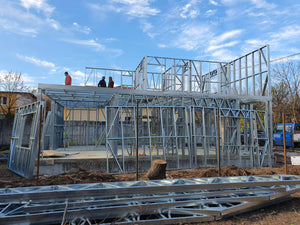 Installation of Metal Frame for a House Equipped in Gold thumbnail