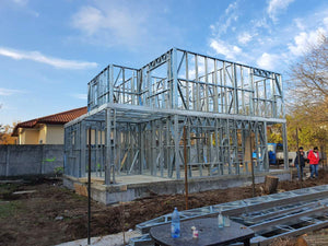 Installation of Metal Frame for a House Equipped in Gold thumbnail