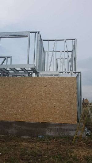 Exterior OSB Cladding in Progress for a House Project in Domnesti thumbnail