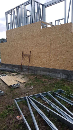 Exterior OSB Cladding in Progress for a House Project in Domnesti thumbnail