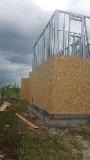 Exterior OSB Cladding in Progress for a House Project in Domnesti thumbnail