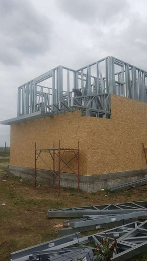 Exterior OSB Cladding in Progress for a House Project in Domnesti thumbnail