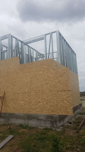 Exterior OSB Cladding in Progress for a House Project in Domnesti thumbnail