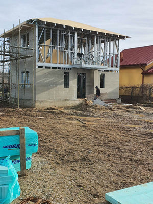 Exterior Cladding with Fibercement for a Metal House with a 162 sqm Area thumbnail