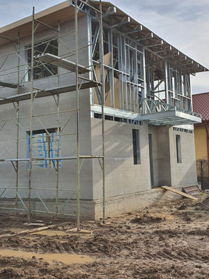 Exterior Cladding with Fibercement for a Metal House with a 162 sqm Area thumbnail