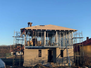 Exterior Cladding with Fibercement for a Metal House with a 162 sqm Area thumbnail