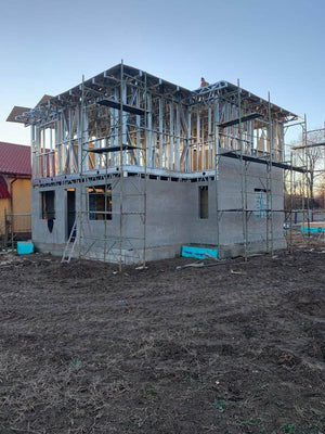 Exterior Cladding with Fibercement for a Metal House with a 162 sqm Area thumbnail