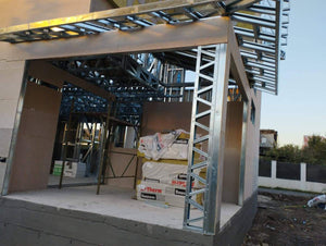 Exterior Cladding of Walls with Fibercement and OSB Roof for Two-Story House thumbnail
