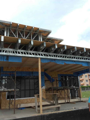 Wall and Roof Cladding with 15mm OSB for a 250 sqm Model House thumbnail