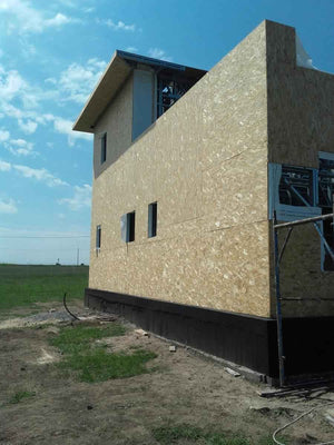 Wall and Roof Cladding with 15mm OSB for a 250 sqm Model House thumbnail