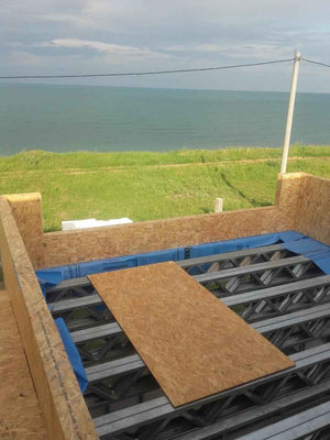 Wall and Roof Cladding with 15mm OSB for a 250 sqm Model House thumbnail