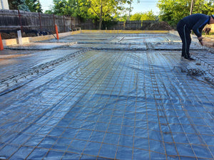 Placing Steel Plates at Ground Level for a Single-Story House Under Construction thumbnail