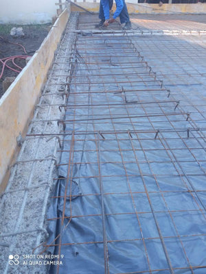 Placing Steel Plates at Ground Level for a Single-Story House Under Construction thumbnail
