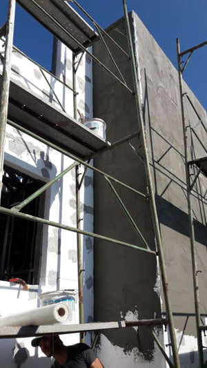 House Project at the Stage of Applying Spackle on the Facades thumbnail