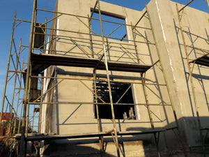 House Project at the Stage of Applying Spackle on the Facades thumbnail