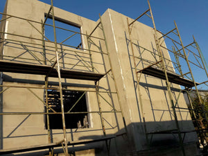 House Project at the Stage of Applying Spackle on the Facades thumbnail