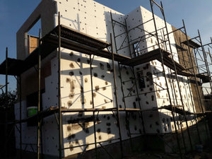 House Project at the Stage of Applying Spackle on the Facades thumbnail