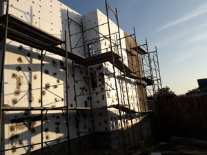 House Project at the Stage of Applying Spackle on the Facades thumbnail