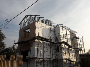 House Project at the Stage of Applying Spackle on the Facades thumbnail