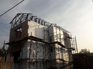 House Project at the Stage of Applying Spackle on the Facades thumbnail