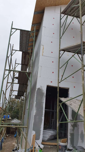 House Project at the Stage of Applying Spackle on the Facades thumbnail