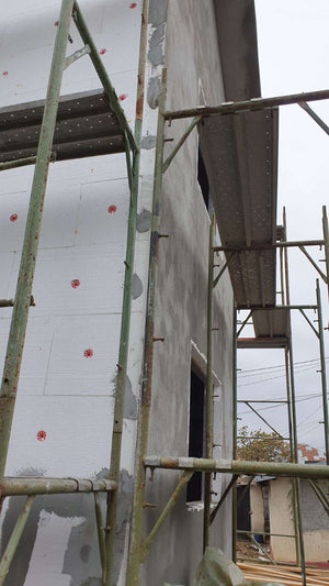 House Project at the Stage of Applying Spackle on the Facades thumbnail