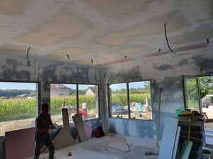 Sanding, Preparation, and Primer Application for a Ground Floor Metal House thumbnail