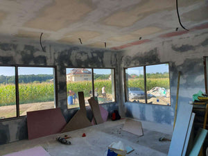 Sanding, Preparation, and Primer Application for a Ground Floor Metal House thumbnail