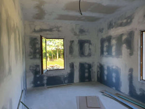 Sanding, Preparation, and Primer Application for a Ground Floor Metal House thumbnail
