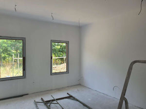 Sanding, Preparation, and Primer Application for a Ground Floor Metal House thumbnail