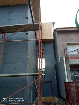 Exterior Thermal Insulation System with Graphite Extruded Polystyrene for a Metal House thumbnail