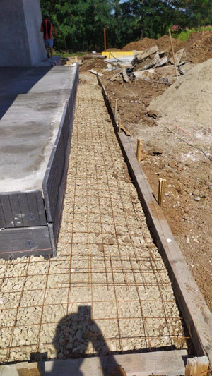 Perimeter Sidewalks for a Metal Structure House thumbnail