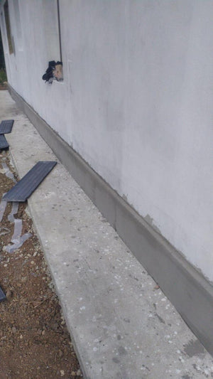 Perimeter Sidewalks for a Metal Structure House thumbnail