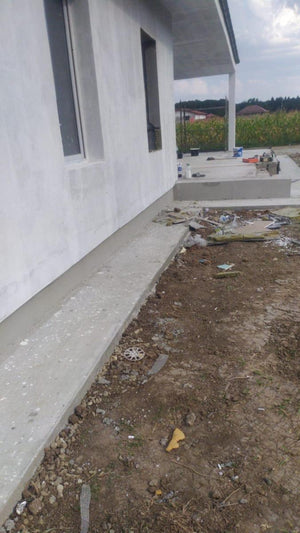 Perimeter Sidewalks for a Metal Structure House thumbnail