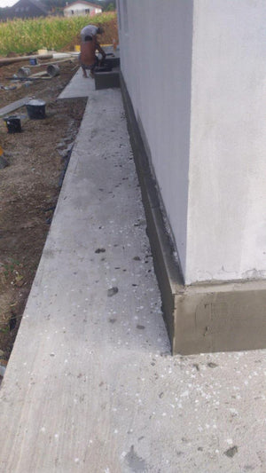Perimeter Sidewalks for a Metal Structure House thumbnail