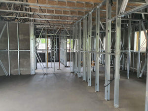 Mechanized Pouring for a Single-Story Metal Structure House thumbnail