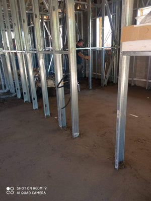 Mechanized Pouring for a Single-Story Metal Structure House thumbnail