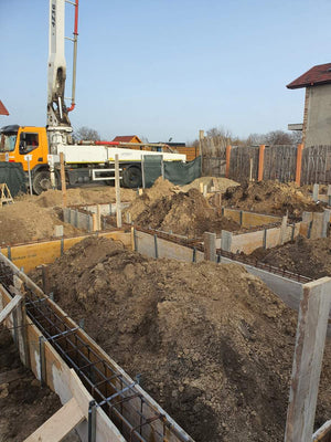 Pouring and Reinforcement of Foundation Beam Base for a Metal House thumbnail