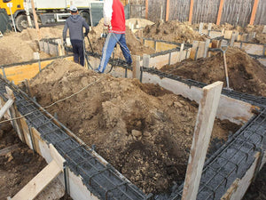 Pouring and Reinforcement of Foundation Beam Base for a Metal House thumbnail