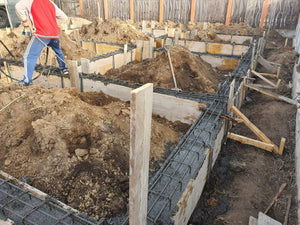 Pouring and Reinforcement of Foundation Beam Base for a Metal House thumbnail