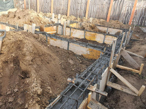 Pouring and Reinforcement of Foundation Beam Base for a Metal House thumbnail
