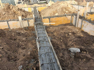 Pouring and Reinforcement of Foundation Beam Base for a Metal House thumbnail