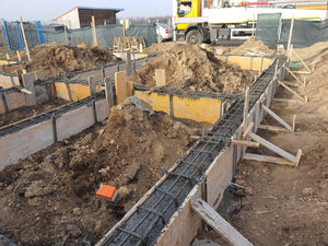 Pouring and Reinforcement of Foundation Beam Base for a Metal House thumbnail
