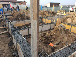 Pouring and Reinforcement of Foundation Beam Base for a Metal House thumbnail