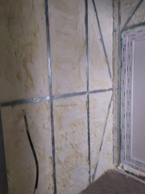 Wall Insulation with Cellulose for a Single-Story Guesthouse thumbnail
